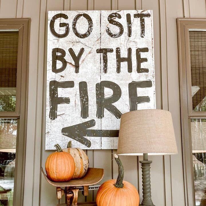 Go Sit By the Fire Canvas Sign